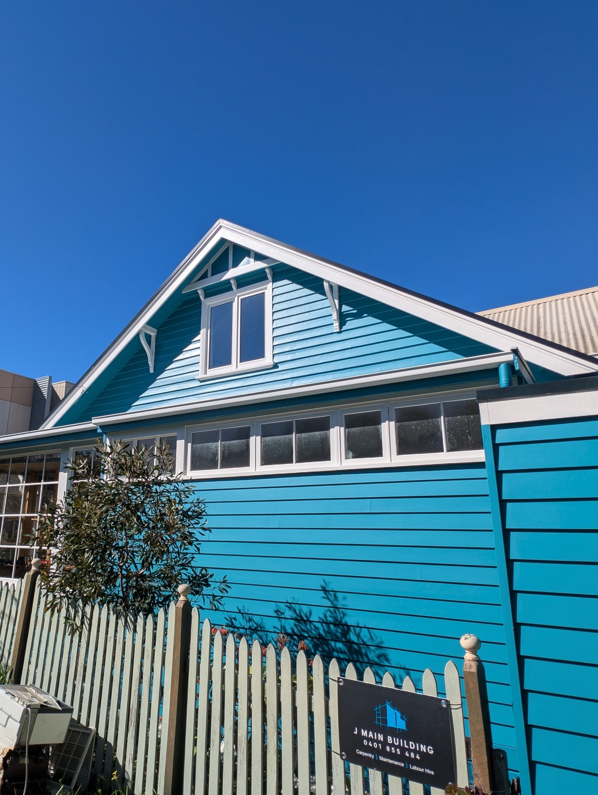 Professional restoration painting on heritage home in Point Lonsdale